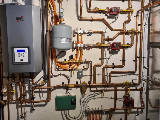 Hydronic heating system providing high efficiency and comfort with Magnolia Fine Homes